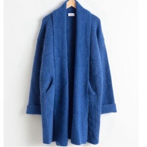 Really cute blue cardigan. Oversized